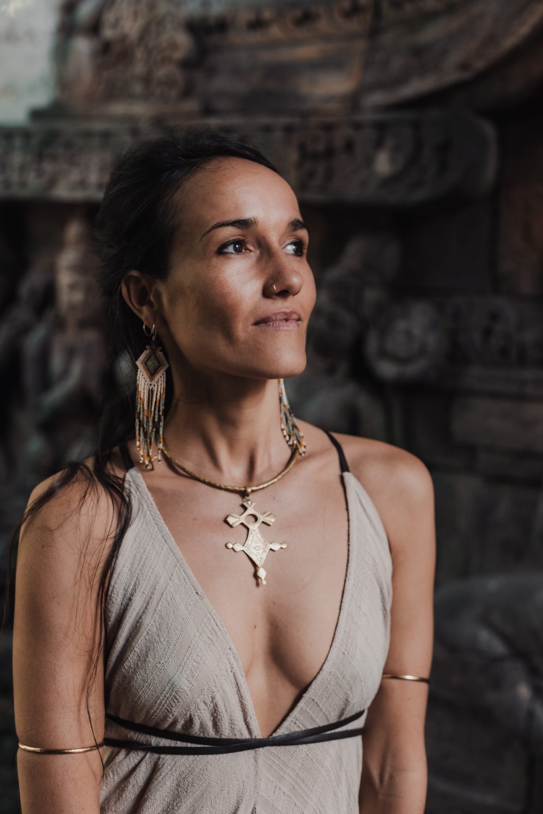 Pao Pamaki wearing tribal jewelry and a beaded necklace