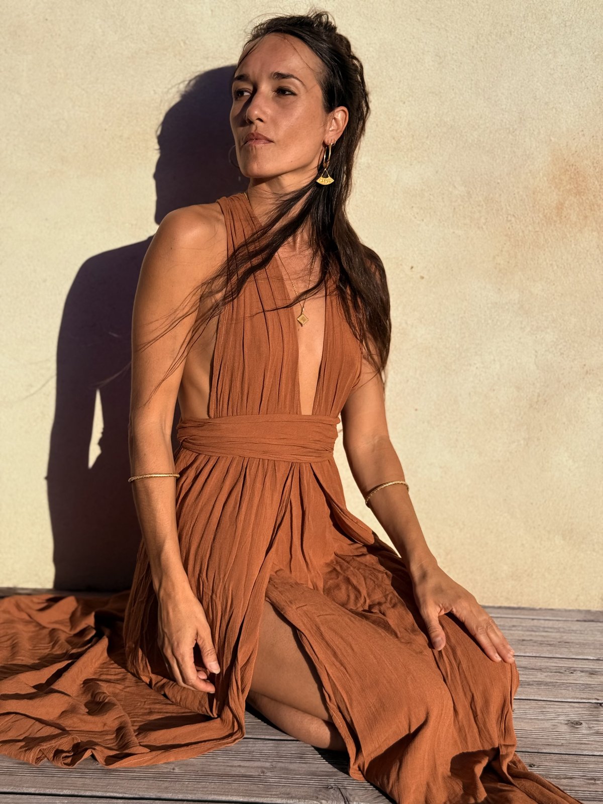 Pao Pamaki sitting outdoors at golden hour